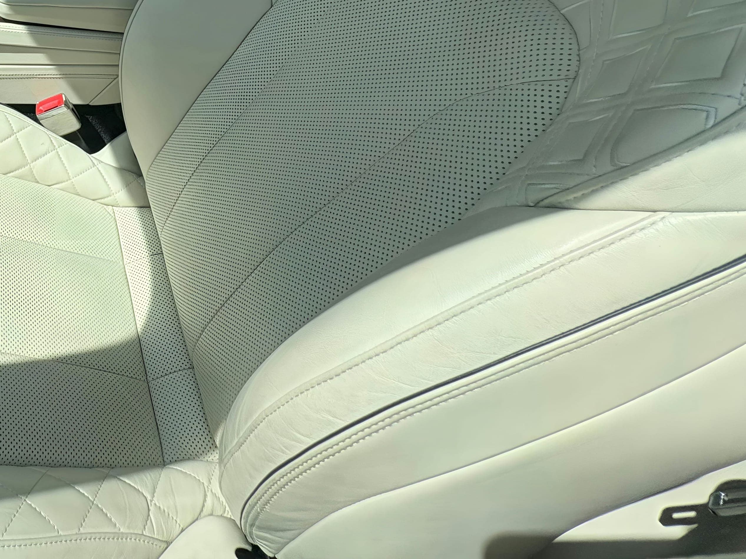 Pale ivory leather brought back to first-light condition.
