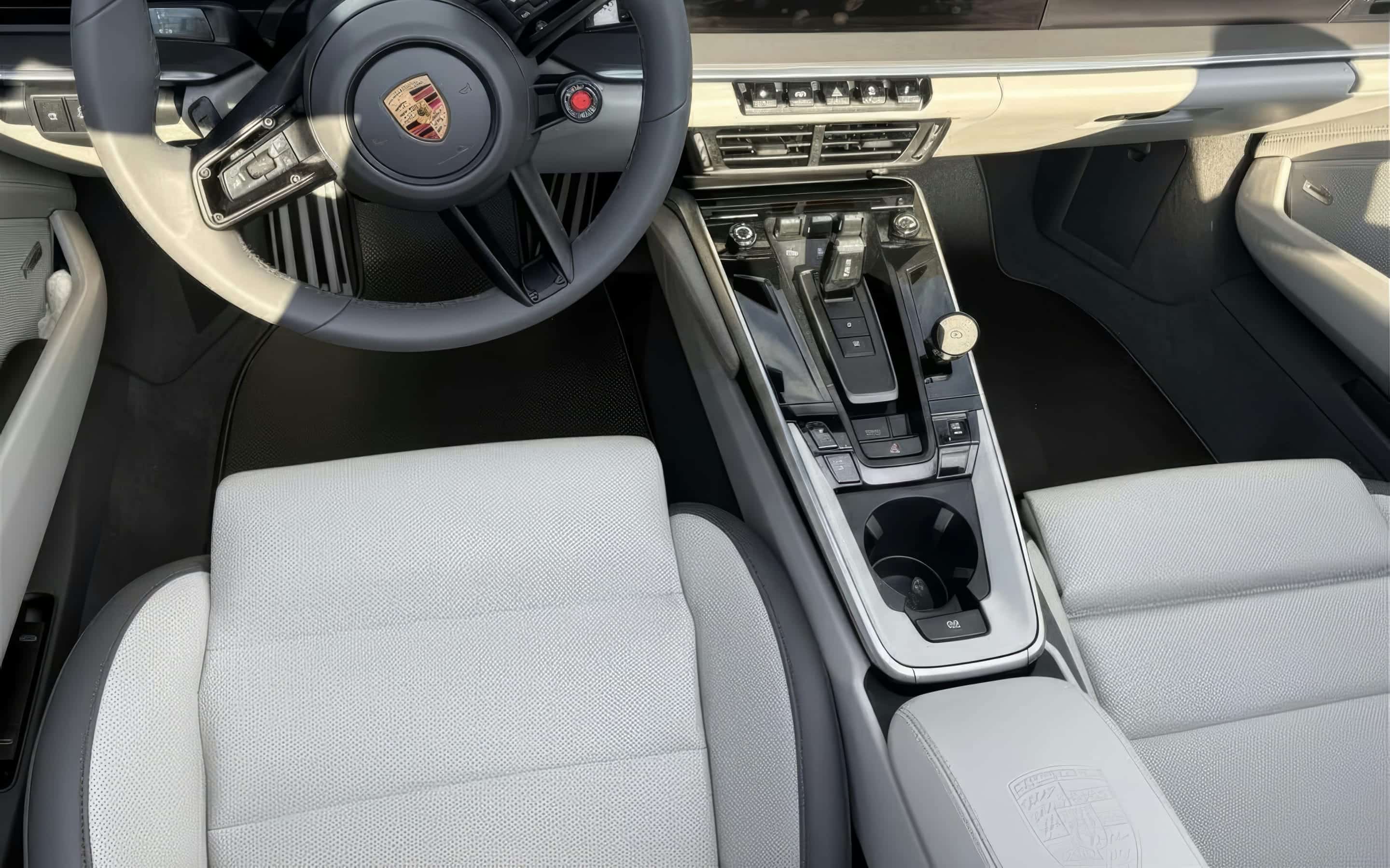 A pale gray cockpit restored to morning condition, every surface crisp.